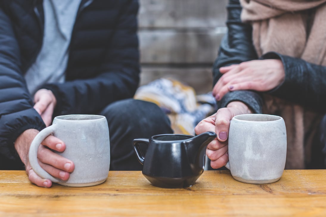 Man and Woman Having a Tea Conversation